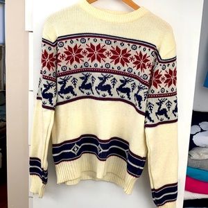 Cream Christmas sweater with reindeer and snow